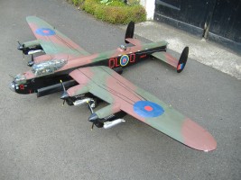 Lancaster model in from of garage doors.